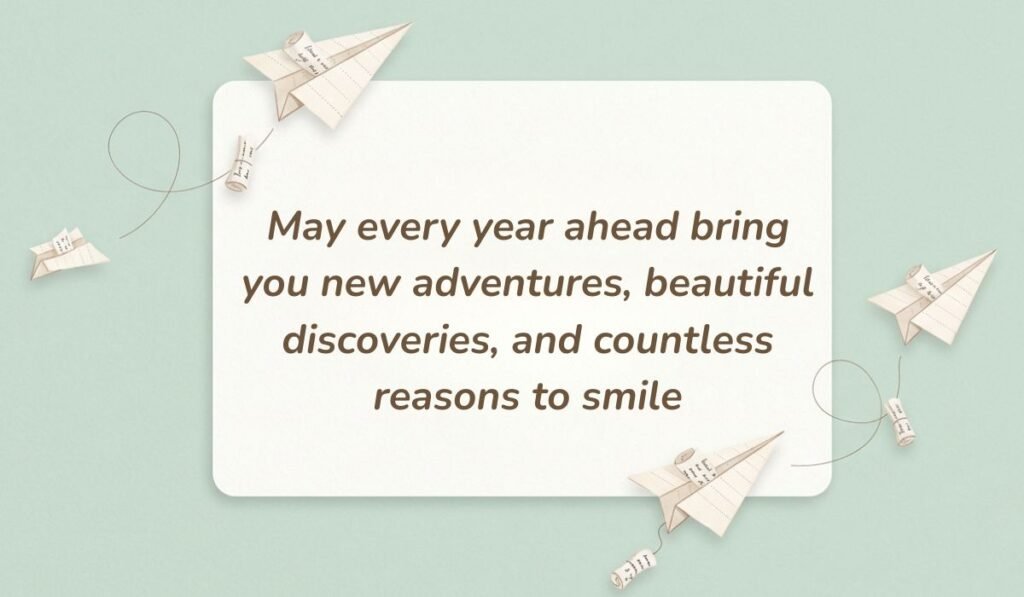 Light green card styled with folded paper airplanes containing 1st birthday wishes for twins stating "May every year ahead bring you new adventures, beautiful discoveries, and countless reasons to smile"