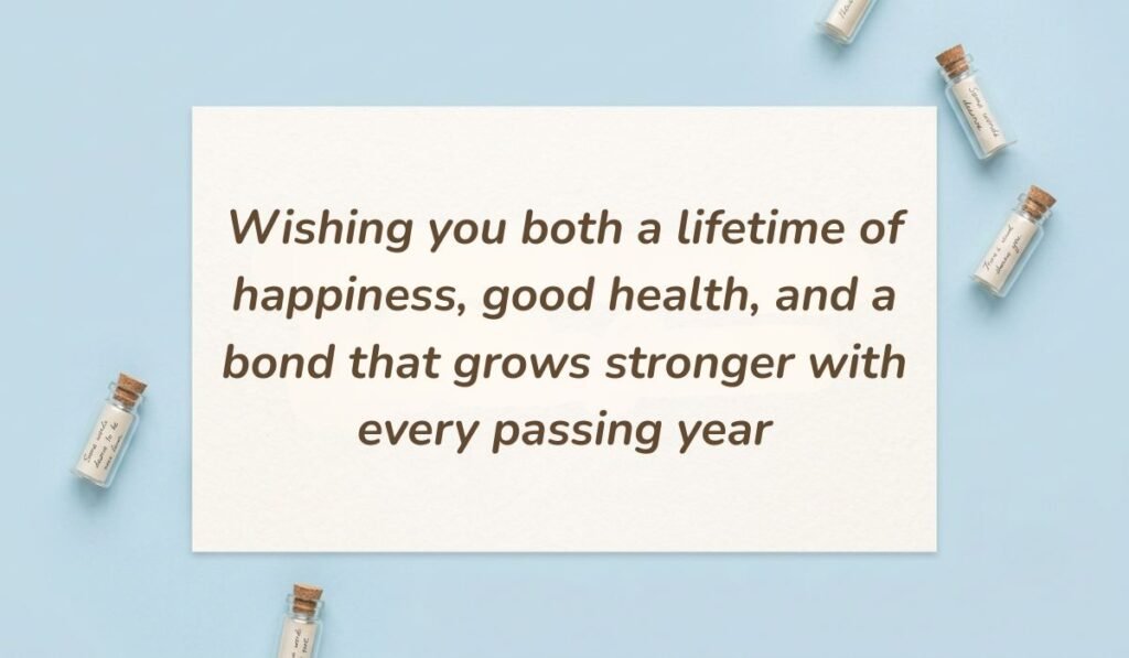 Blue flat lay with glass message bottles displaying 1st birthday wishes for twins reading "Wishing you both a lifetime of happiness, good health, and a bond that grows stronger with every passing year"