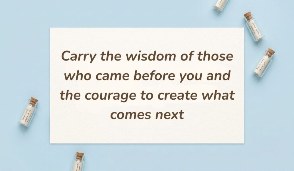 Light blue flatlay background with tiny message bottles showcasing african american good morning quotes reading "Carry the wisdom of those who came before you and the courage to create what comes next"