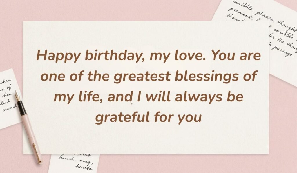 Soft pink stationery setup with a fountain pen featuring sweet birthday quotes for husband reading "Happy birthday, my love. You are one of the greatest blessings of my life, and I will always be grateful for you"
