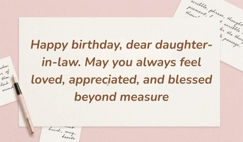 Soft pink stationery arrangement featuring a fountain pen showing birthday wishes for daughter in law reading "Happy birthday, dear daughter-in-law. May you always feel loved, appreciated, and blessed beyond measure"