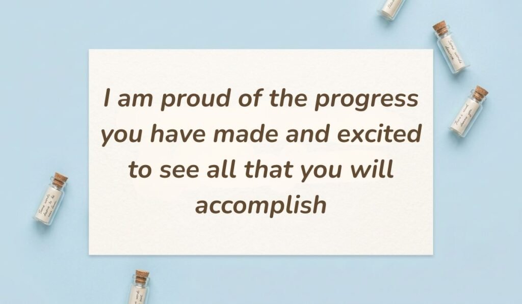 Soft blue backdrop with small glass message bottles presenting birthday wishes for student from teacher reading "I am proud of the progress you have made and excited to see all that you will accomplish"