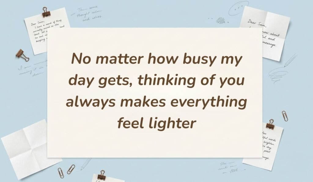 Light blue desk setup with paper clips and sticky notes presenting good evening messages for her reading "No matter how busy my day gets, thinking of you always makes everything feel lighter"