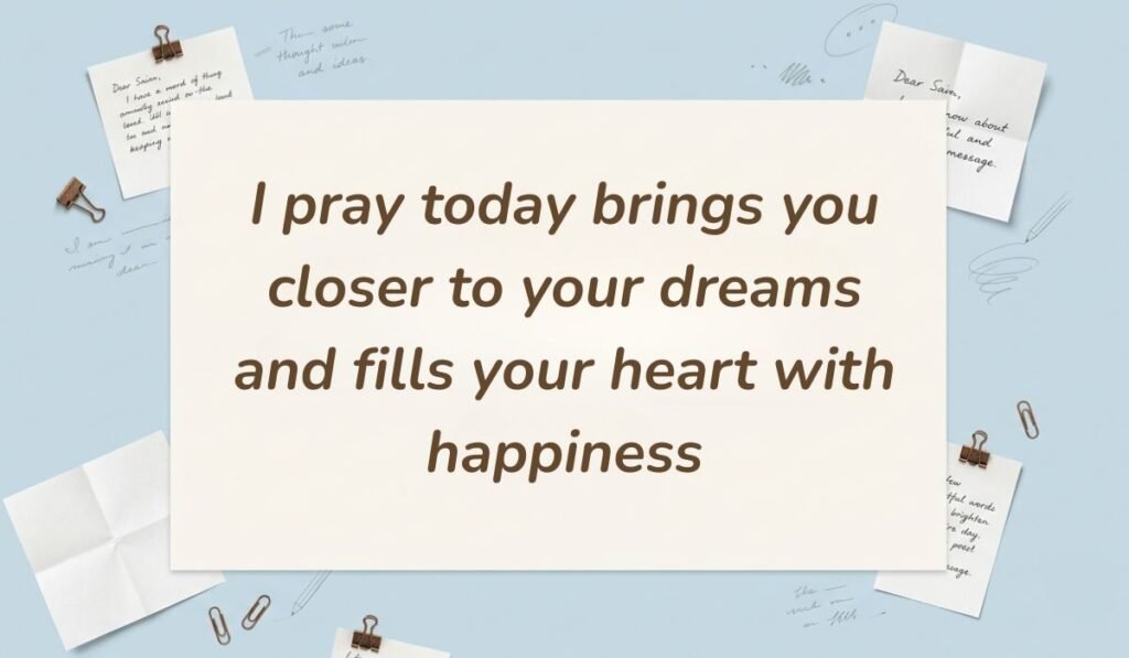 Soft blue stationery background with paper clips and notes presenting good morning messages for aunt stating "I pray today brings you closer to your dreams and fills your heart with happiness"