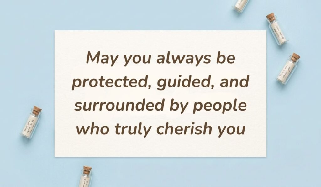 Light blue flatlay setup with mini message bottles showcasing good morning messages for aunt reading "May you always be protected, guided, and surrounded by people who truly cherish you"