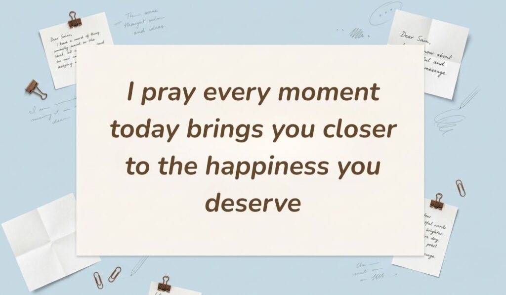 Soft blue stationery background with paper clips and notes presenting good morning messages for mom reading "I pray every moment today brings you closer to the happiness you deserve"