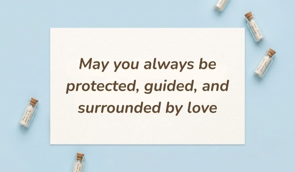 Light blue flatlay background with tiny message bottles showcasing good morning messages for mom reading "May you always be protected, guided, and surrounded by love"