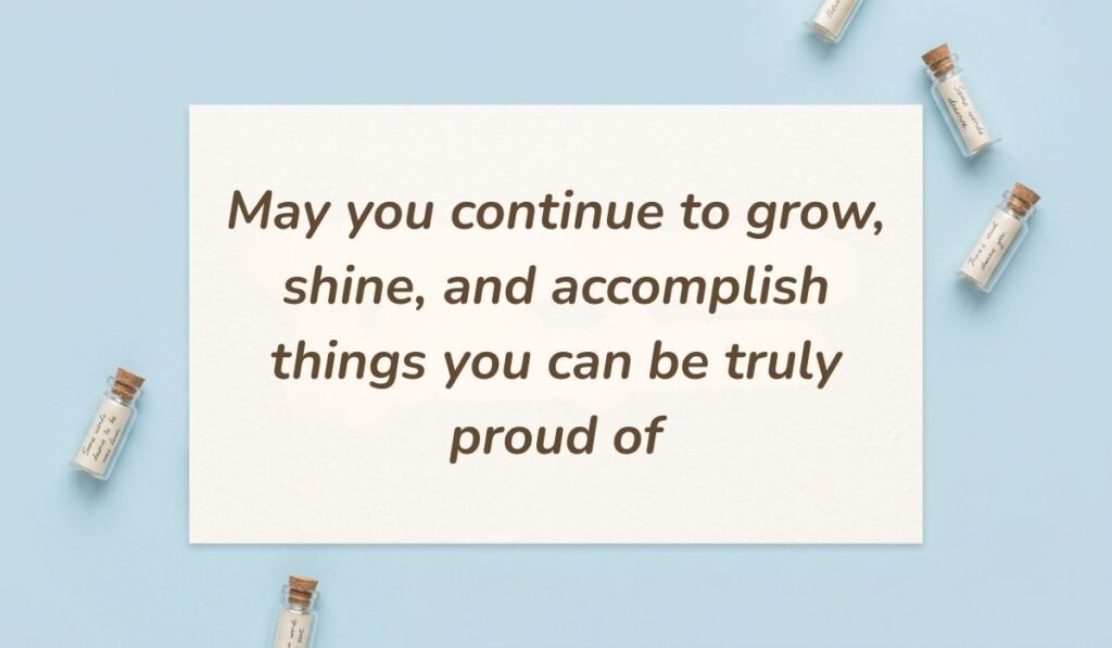 Light blue flat lay with mini message bottles featuring inspiring happy birthday wishes for coworker stating "May you continue to grow, shine, and accomplish things you can be truly proud of"