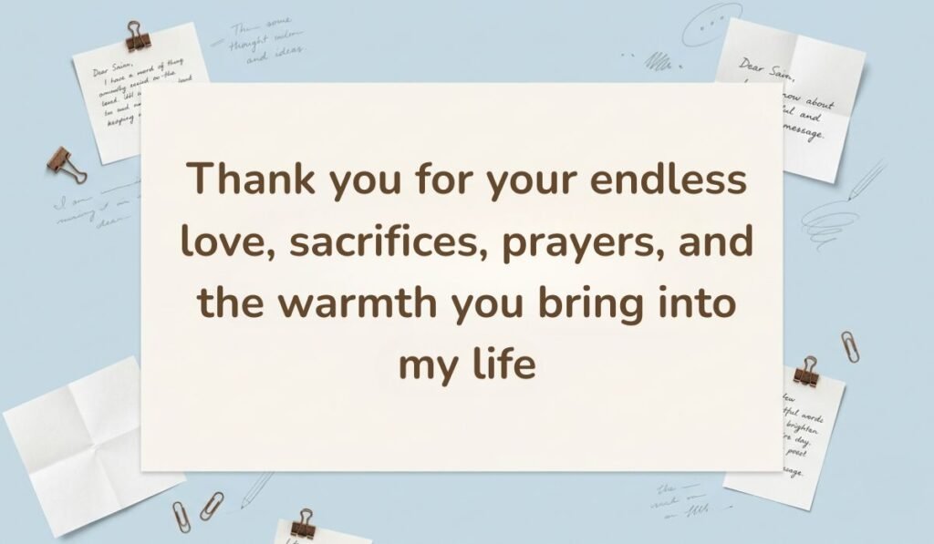 Sky blue flat-lay background with paper clips and handwritten note slips, showcasing a grateful happy new month message to my mother: "Thank you for your endless love, sacrifices, prayers, and the warmth you bring into my life."
