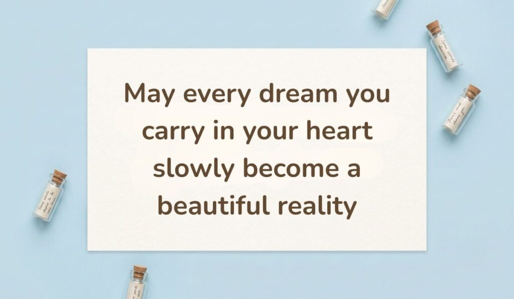Clean blue background decorated with small glass wish bottles containing miniature rolled scrolls, highlighting a warm happy new month message to my mother: "May every dream you carry in your heart slowly become a beautiful reality."