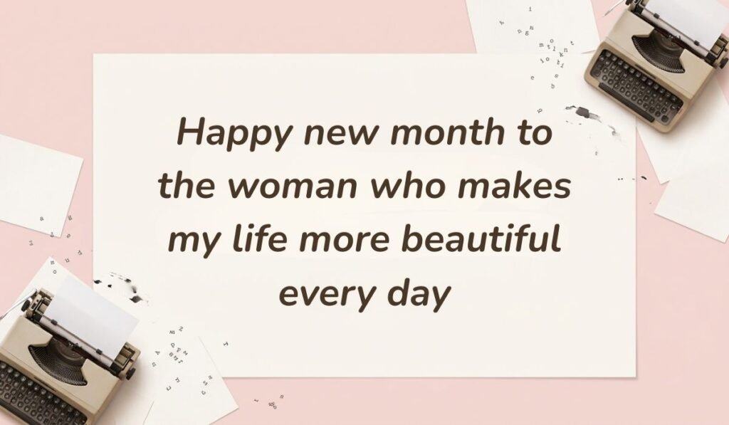 Soft pink background styled with vintage typewriters and typed paper notes, displaying a sweet happy new month message to my wife: "Happy new month to the woman who makes my life more beautiful every day".
