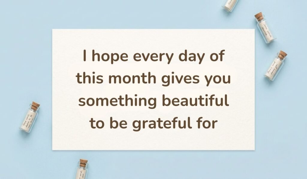 Clean blue background decorated with small glass wish bottles containing miniature rolled scrolls, highlighting inspiring happy new month messages for dad: "I hope every day of this month gives you something beautiful to be grateful for."