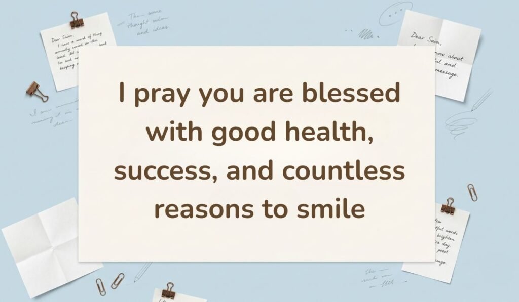 Light blue background accented with paper clips and handwritten sticky notes, displaying a prayerful happy new month message for uncle: "I pray you are blessed with good health, success, and countless reasons to smile."