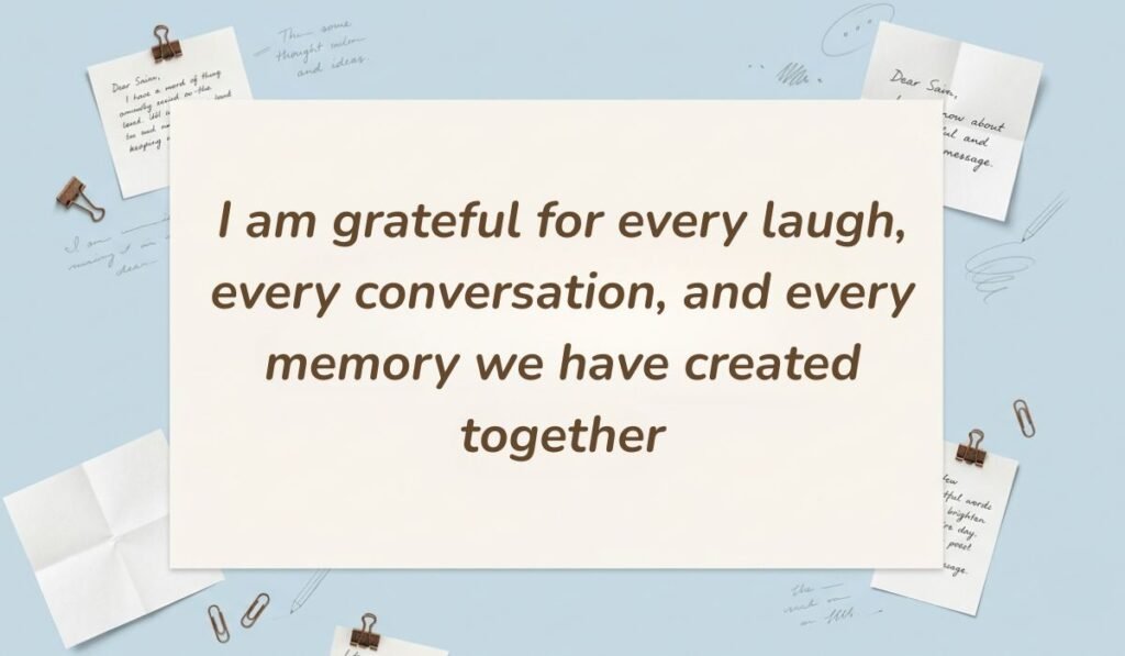 Light blue desk flatlay with sticky notes and paper clips presenting heart touching messages for cousin reading "I am grateful for every laugh, every conversation, and every memory we have created together"