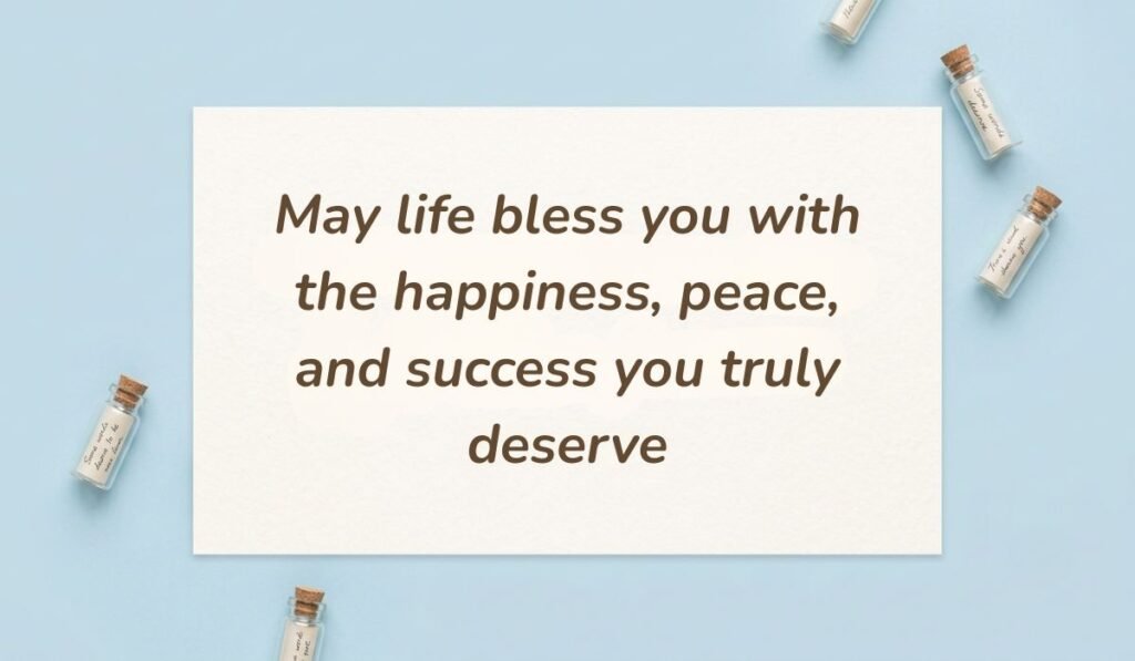 Soft blue background decorated with miniature message bottles presenting heart touching messages for cousin reading "May life bless you with the happiness, peace, and success you truly deserve"