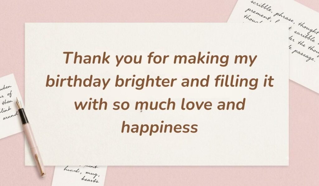 Soft pink background with a fountain pen and handwritten notes featuring a thank you message for all the birthday wishes reading, "Happy 50th birthday! Here’s to five wonderful decades and an even more extraordinary journey ahead"