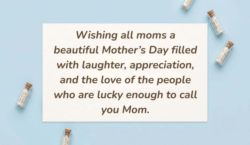 Light blue flat lay with mini glass message bottles showing happy mothers day wishes for all moms reading, "Wishing all moms a beautiful Mother’s Day filled with laughter, appreciation, and the love of the people who are lucky enough to call you Mom."