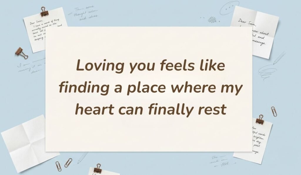 Light blue workspace scene with paperclips and handwritten notes presenting love messages for him stating, "Loving you feels like finding a place where my heart can finally rest"