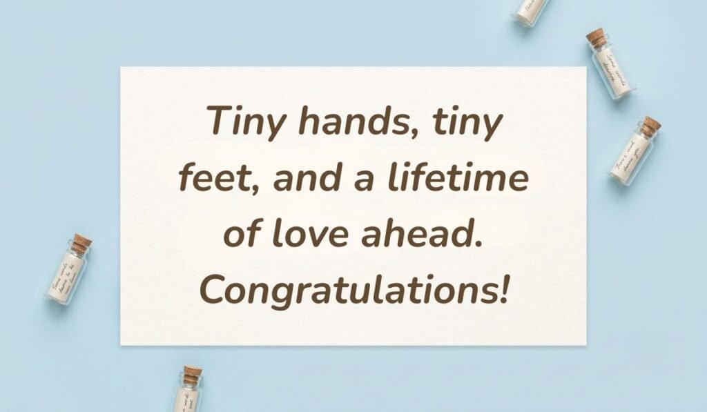 Light blue flat lay with mini glass message bottles showing messages for baby shower card reading, "Tiny hands, tiny feet, and a lifetime of love ahead. Congratulations!"