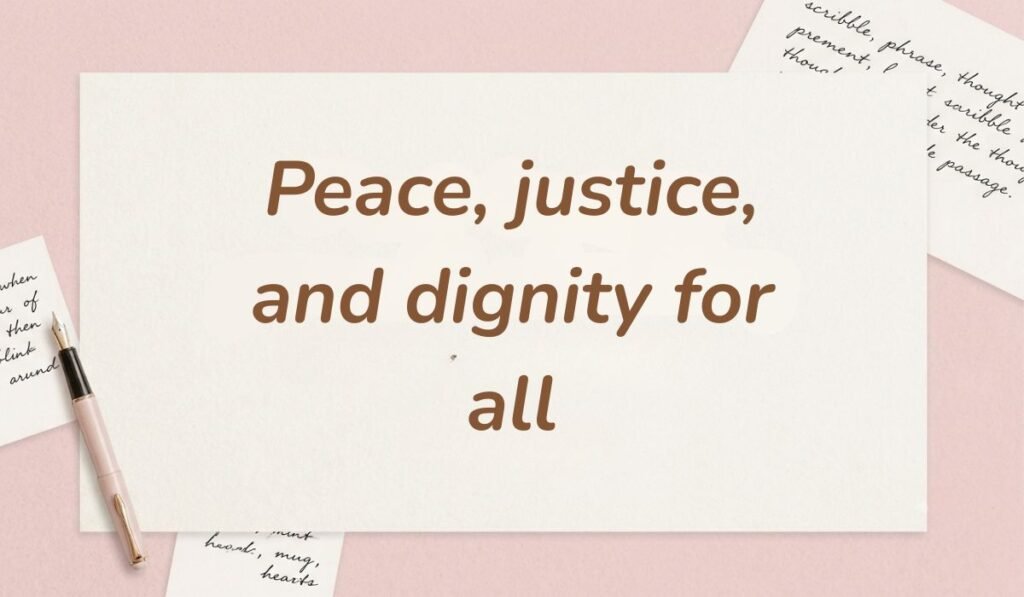 Soft pink desk layout with a fountain pen and handwritten stationery cards showcasing short quotes for protest signs stating, "Peace, justice, and dignity for all"