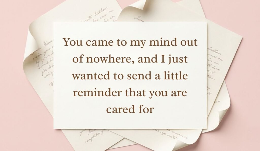 Soft pink backdrop framed with layered vintage parchment paper presenting thinking of you messages reading, "You came to my mind out of nowhere, and I just wanted to send a little reminder that you are cared for"
