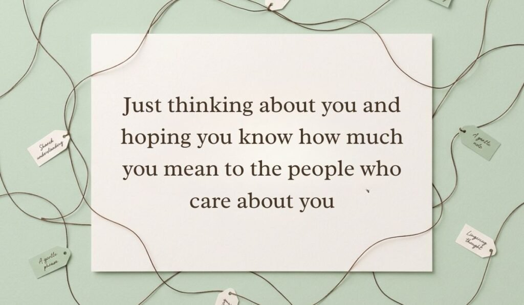 Sage green surface framed by interconnected twine strings and small message tags featuring thinking of you messages stating, "Just thinking about you and hoping you know how much you mean to the people who care about you"