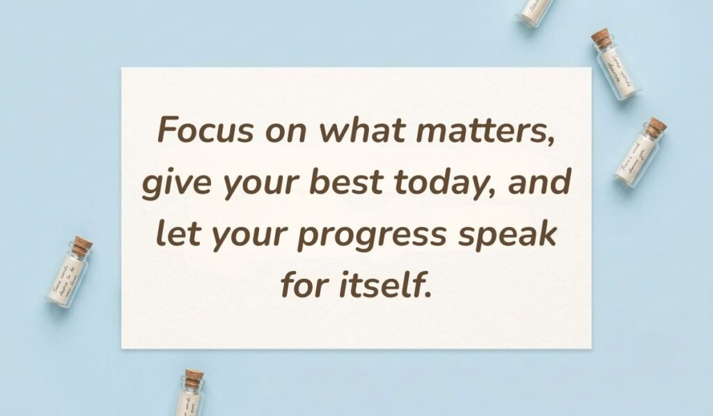 Light blue flat lay with mini glass message bottles showing thursday motivational quotes for work reading, "Focus on what matters, give your best today, and let your progress speak for itself."