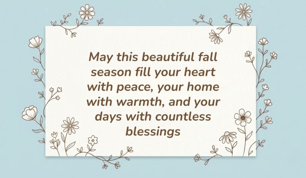 Soft light blue background with a floral-bordered white card featuring fall blessings quotes reading, "May this beautiful fall season fill your heart with peace, your home with warmth, and your days with countless blessings"