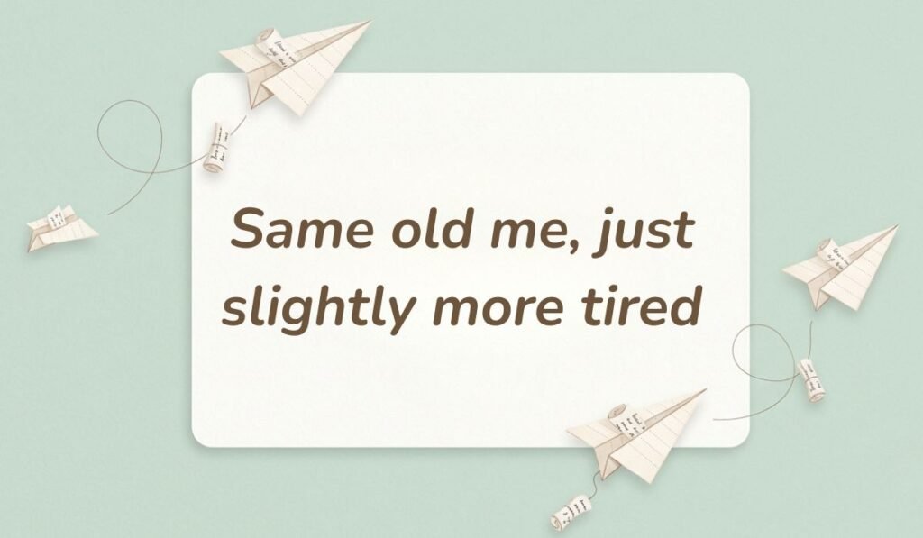 Light sage green surface decorated with folded paper airplanes showcasing funny responses to what's up stating, "Same old me, just slightly more tired"